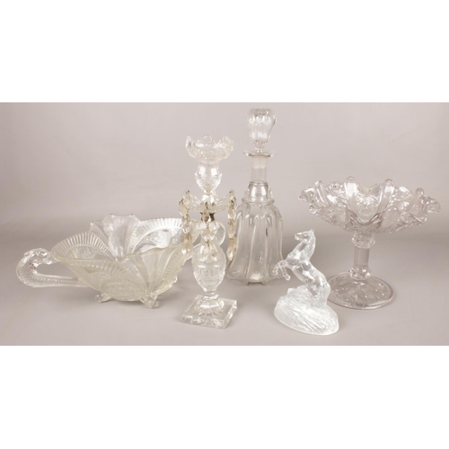 80 - A quantity of cut glassware. Including candlestick light, decanter, horse paperweight, pedestal bowl... 