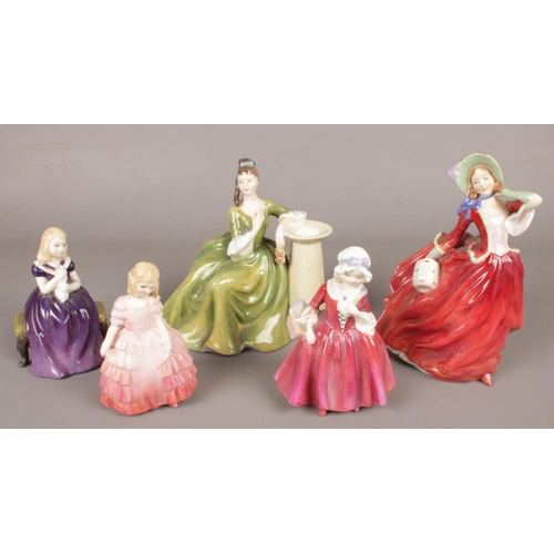 81 - Five ceramic Royal Doulton lady figures.