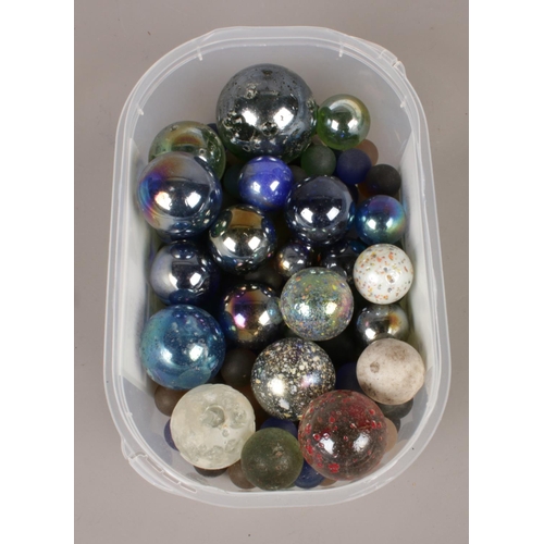 87 - A collection of assorted glass marbles.