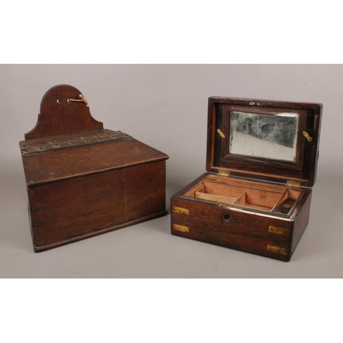 112 - A Victorian rosewood jewellery box, along with an oak candle box.