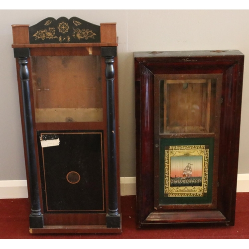 385 - Two mahogany cased American style wall clock cases. With coloured glass panels.