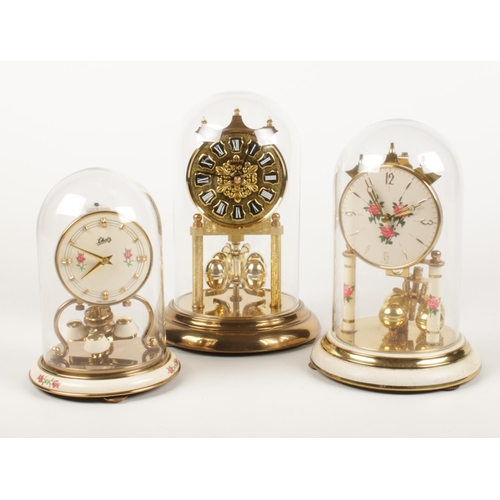 184 - Three brass torsion clocks. Incudes Schatz example.