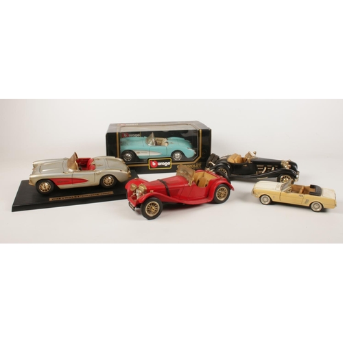 195 - A group of die cast vehicles. Burago Jaguar SS 100 1/18, Burago Mercedes Benz Roadster 1/20, Burago ... 