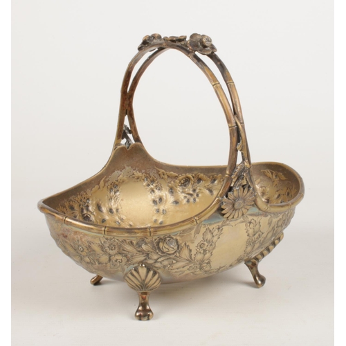 211 - A John Round & Son silver plated basket. With bamboo effect handle and floral decoration.