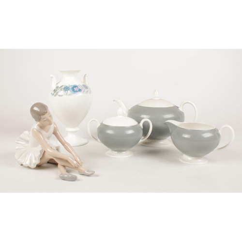212 - A group of ceramic's. Wedgwood teapot, milk jug, lidded sugar bowl & a Nao ballerina figurine.