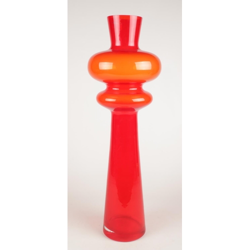 219 - A large decorative red glass vase. Handmade in Poland. (70cm).
