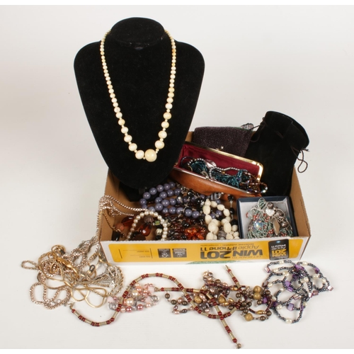221 - A collection of costume jewellery. Mainly necklaces, includes graduated bone example, gilt metal etc... 