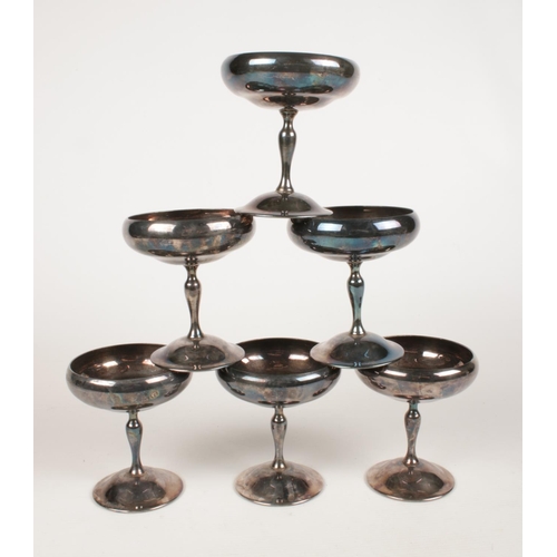 235 - A set of six silver plated champagne glasses - made in Spain. H: 11cm.
