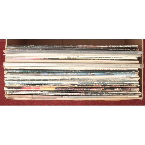 292 - A box of LP records. Includes Alice Cooper, Roxy Music, Pretty Things etc.