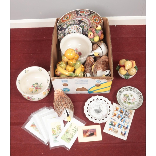 366 - A box of miscellaneous. Includes Portuguese ceramics, modern Imari style plates, Gandhi stamps etc.