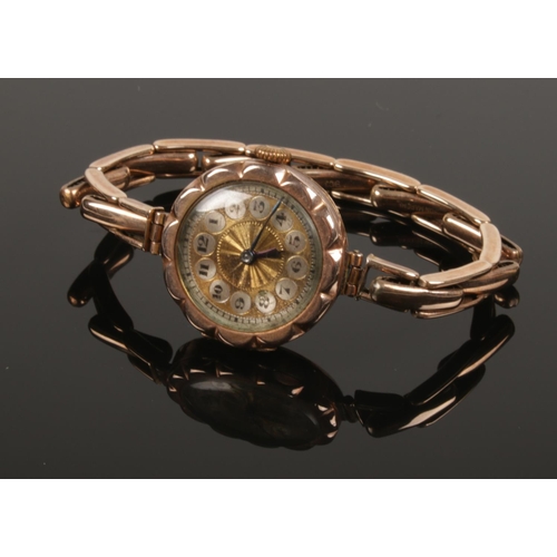 405 - A ladies 9ct gold manual wristwatch on 9ct gold expanding strap. Movement stamped Bonnet & Co. (18.6... 
