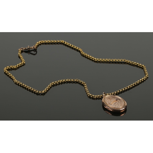 408 - A 9ct gold front and back locket on rolo link chain. Chain stamped gold. (gross weight 12.5g).