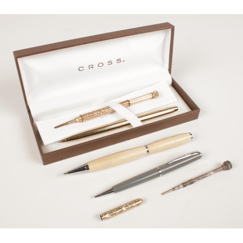 417 - A Cross pen box with contents. Including Sheaffer pen, old retractable pencils, etc.