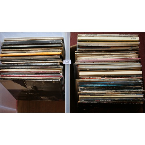 340 - Two boxes of vinyl LP records. Elton John, Barry White, Beach Boys, Meat Loaf, Bob Dylan examples et... 