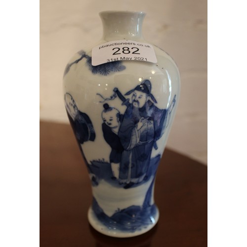 282 - A blue and white Chinese vase, decorated with Oriental figures in landscape. H: 16cm.