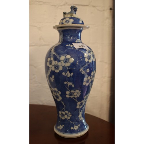 280 - An early 20th Century Chinese blue and white prunus blossom covered baluster vase. H: 33cm.