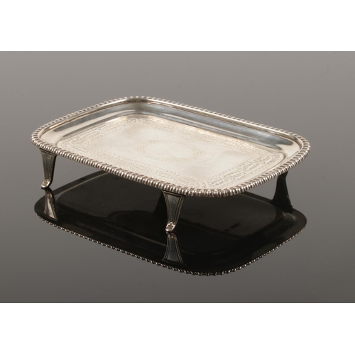 468 - An Edwardian silver card tray. Assayed Sheffield 1903 by Thomas Bradbury & Sons Ltd.