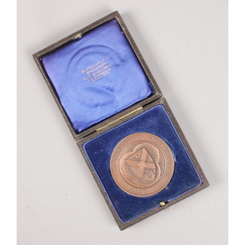 417 - A cased University of Edinburgh Mathematics presentation medal, 1938-39.