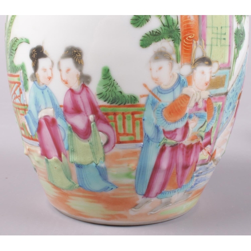 420 - A Chinese famille rose barrel shaped jar decorated with figures.