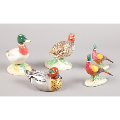 435 - A group of Beswick figures. A pair of Pheasants, Mallard, Common Teal & a partridge. (original boxes... 