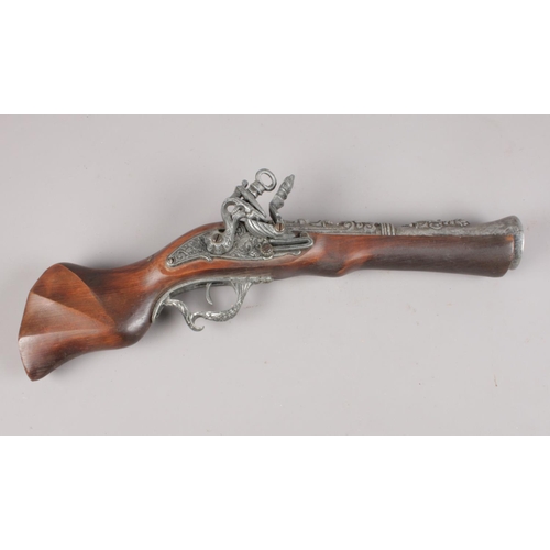 61 - A replica Blunderbuss pistol. (42cm length)