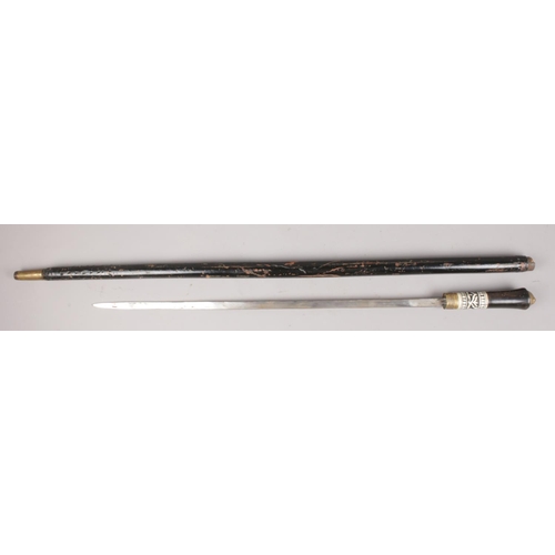 446 - A Victorian ebonised sword stick. With brass lion mask pommel.