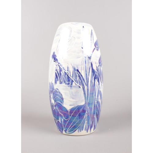 453 - An Anita Harris Blue and White Lustre 'Dragonfly' Vase, gold signed, 17.5cm high.