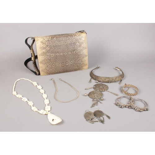 65 - A group of costume jewellery & Python skin handbag. necklaces, earrings examples etc.