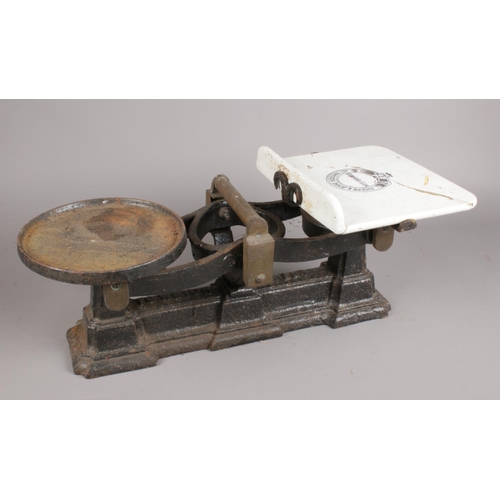 73 - A set of cast iron kitchen scales. Joseph & Jesse Siddons Ltd.