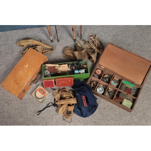 525 - A collection of vintage fishing equipment. Includes Milward's and Bruce & Walker rods, floats, Garci... 