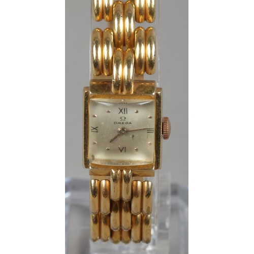 566 - A ladies yellow metal Omega manual bracelet watch.