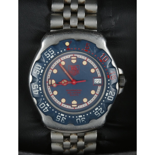 568 - A boxed gents Tag Heuer Professional stainless steel wristwatch. With rotating bezel and date displa... 