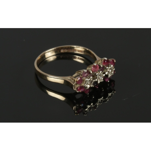 573 - A 9 karat Gold Diamond and Garnet Ring (Size P)
Gross Weight: 2.72g
Diamond Sizes 1/64.