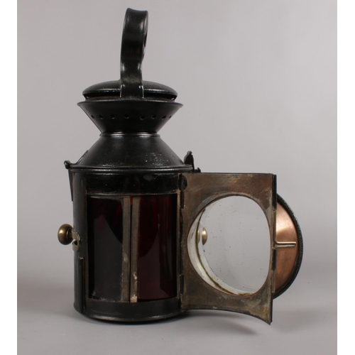 473 - A Railway 3 aspect sliding knobs handlamp. (33cm height)