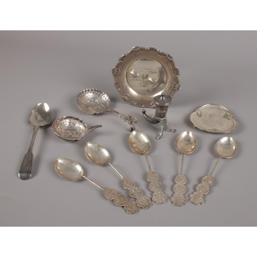 474 - A collection of silver items, five Chinese tea spoons each with Shou roundels, Cornucopia pepper pot... 