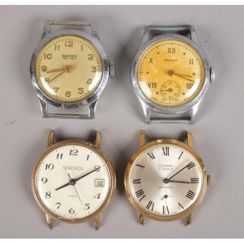 584 - Four gents mechanical wristwatch heads. Sekonda, two Newmark examples and Systema.