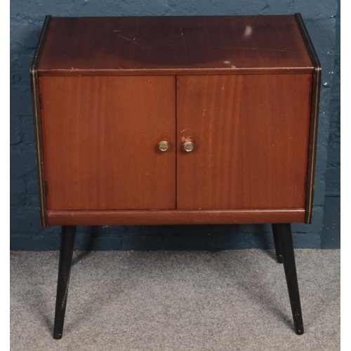 391 - A retro mahogany side cabinet with fitted interior and painted legs.