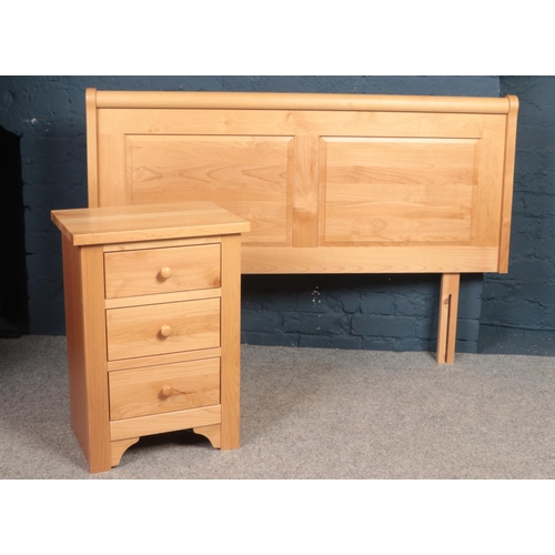 392 - A collection of Beech bedroom furniture - comprising of a dressing table with matching stool, mirror... 