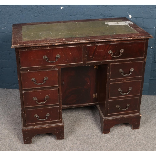 404 - A Mahogany leather top twin pedestal desk. (92cm width 79cm height 49cm depth)