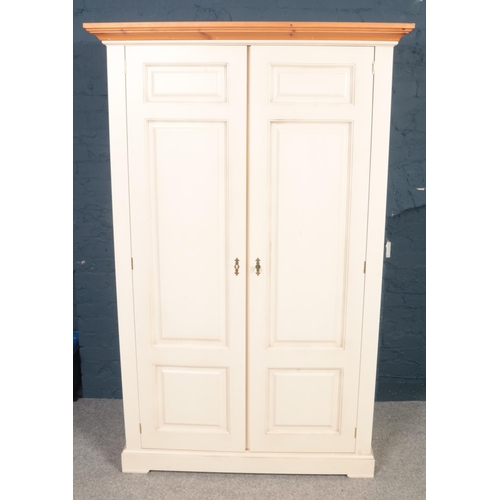 406 - A Barker and Stonehouse modern painted two-door wardrobe . H:198cm,W:112.5cm, D:55cm.