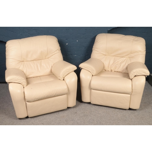 410 - A 'G-Plan' three seater sofa together with two matching electric recliners in cream leather. 
Sofa: ... 