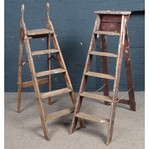 485 - Two sets of decorators wooden step ladders.