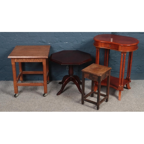 519 - Four pieces of occasional furniture. Including oak trolley, mahogany octagonal table, etc.