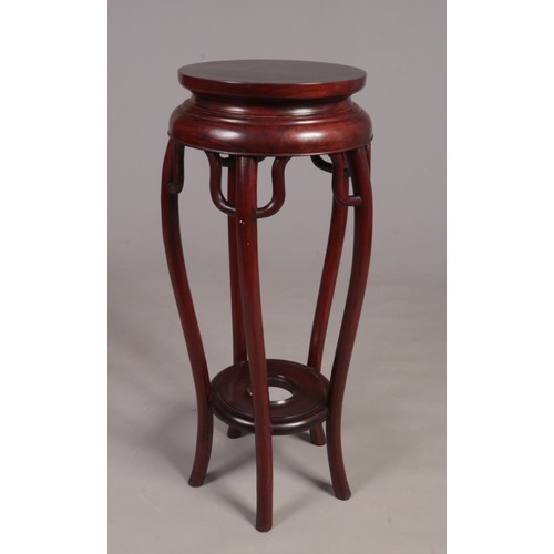 306 - A modern exotic hardwood jardinière/plant stand.