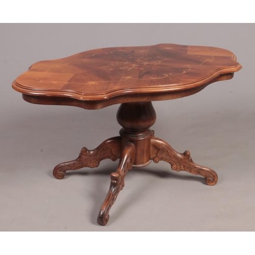 317 - An Italian style centre pedestal coffee table.