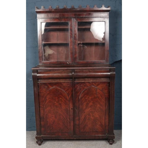 324 - A Regency mahogany bookcase cabinet. (190cm x 108cm x 51cm)