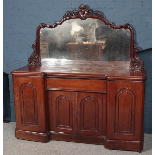 325 - A large Victorian carved mahogany mirror back sideboard. (176cm x 170cm x 58cm)