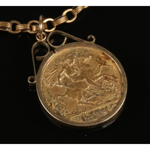 222 - An Edward VII gold half sovereign, 1908, in 9ct gold mount. With yellow metal chain. (sovereign and ... 