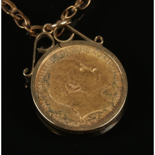 222 - An Edward VII gold half sovereign, 1908, in 9ct gold mount. With yellow metal chain. (sovereign and ... 