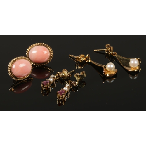 229 - Three pairs of earrings. Two marked for 9ct, the other yellow metal set with diamonds, seed pearls a... 